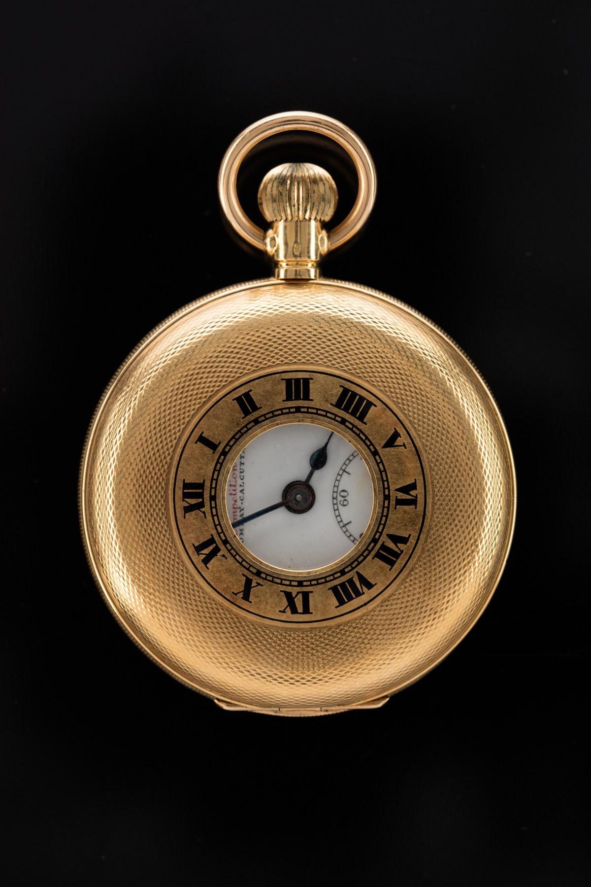 Demi-savonnette West End Watch Co. en or, couvercle fermé avec guichet central